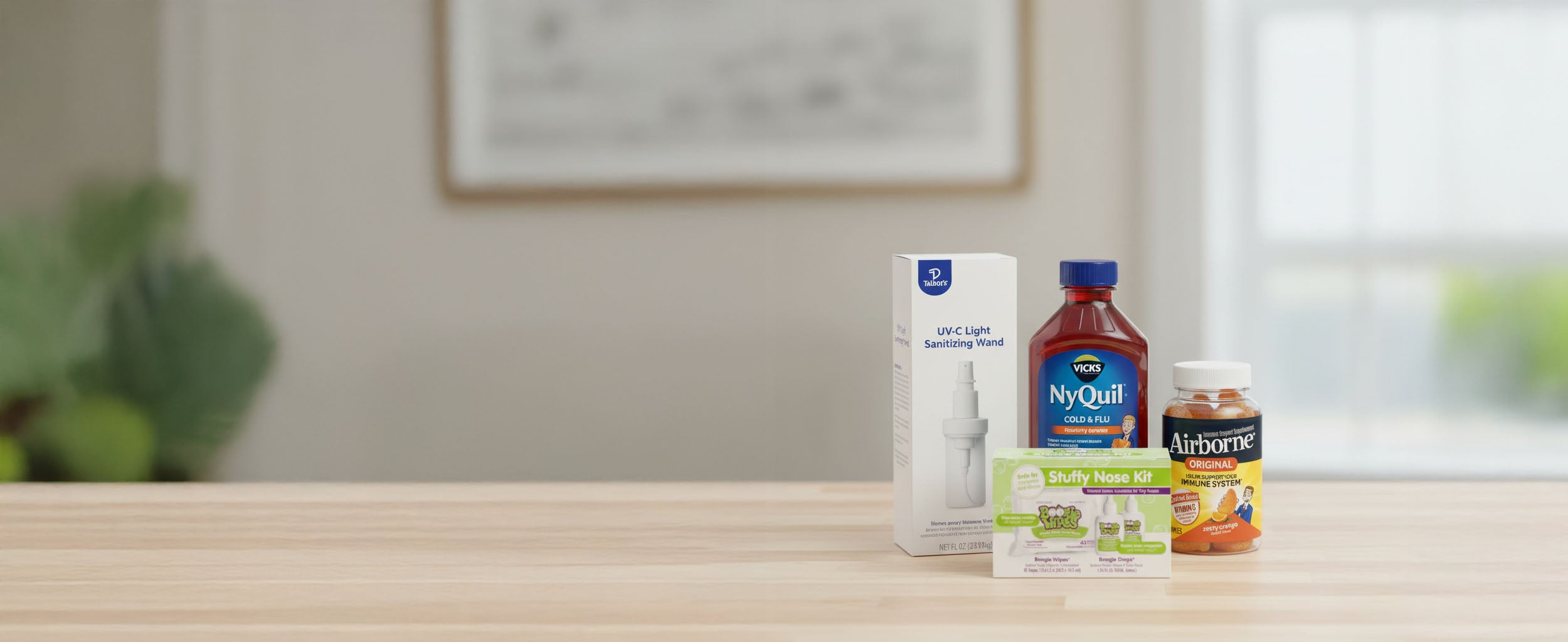 Medicinal products including NyQuil, Airborne, and a Stuffy Nose Kit on a wooden surface. All HSA and FSA Eligible.