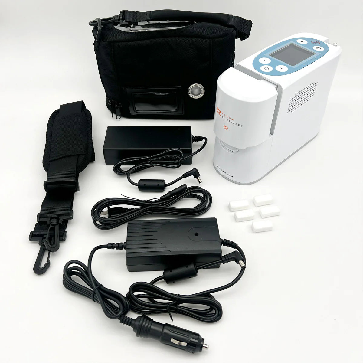 Rhythm P2-E6 and its carrying case, AC and DC chargers for travel friendly power options.